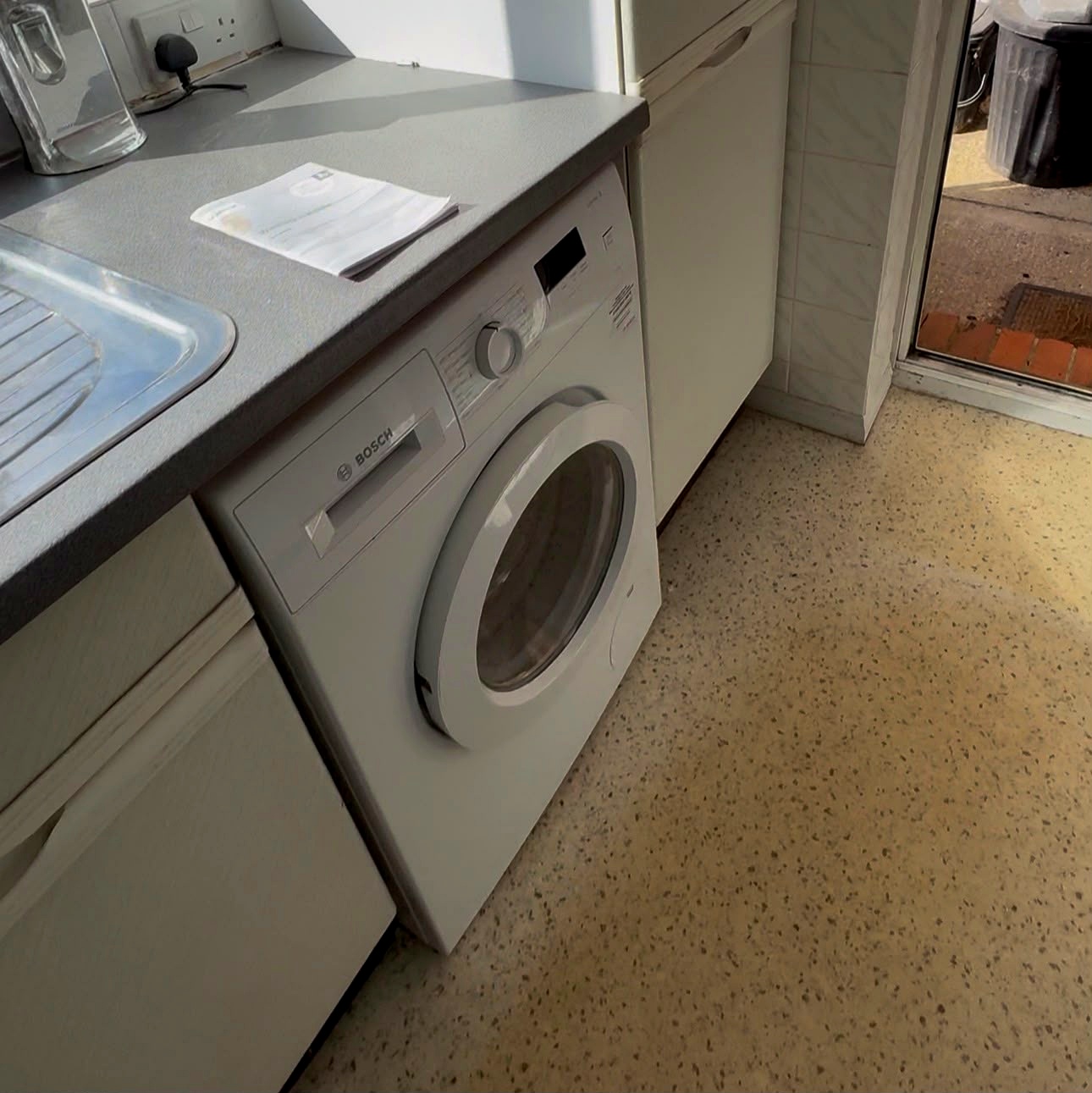 Washing machine in kitchen