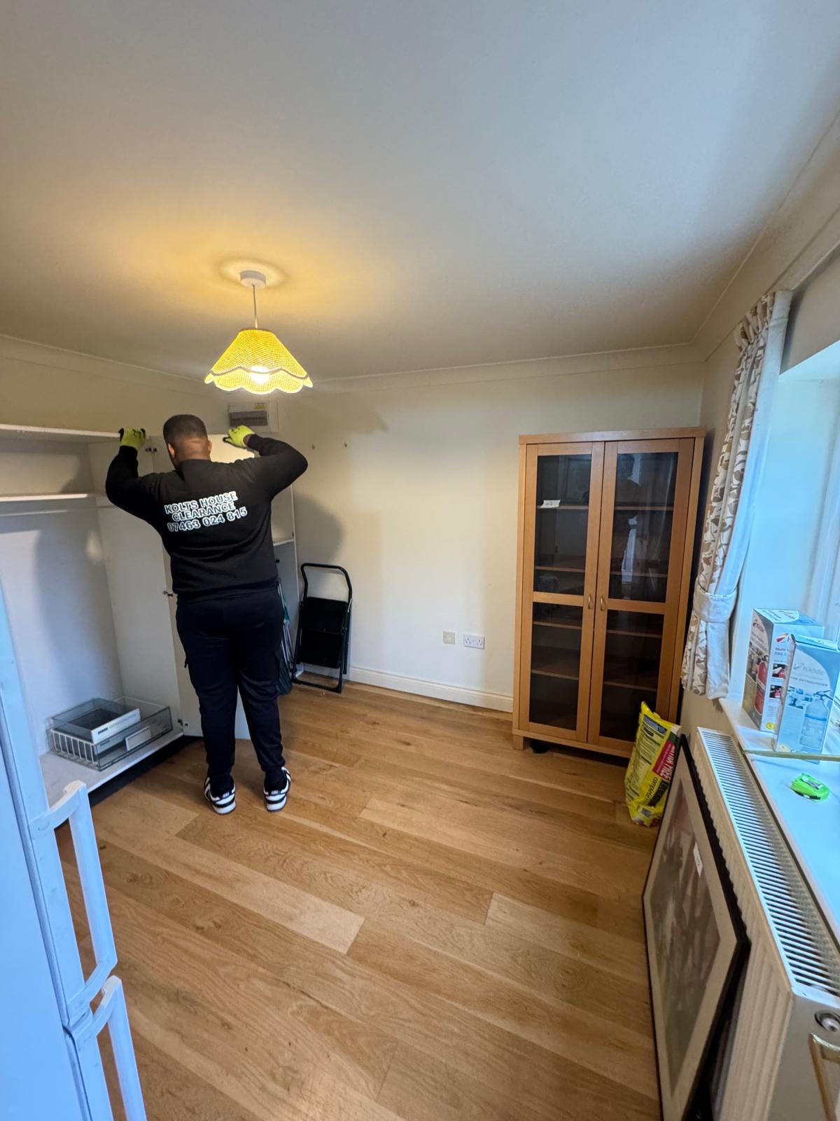 clearing cluttered room for house clearance