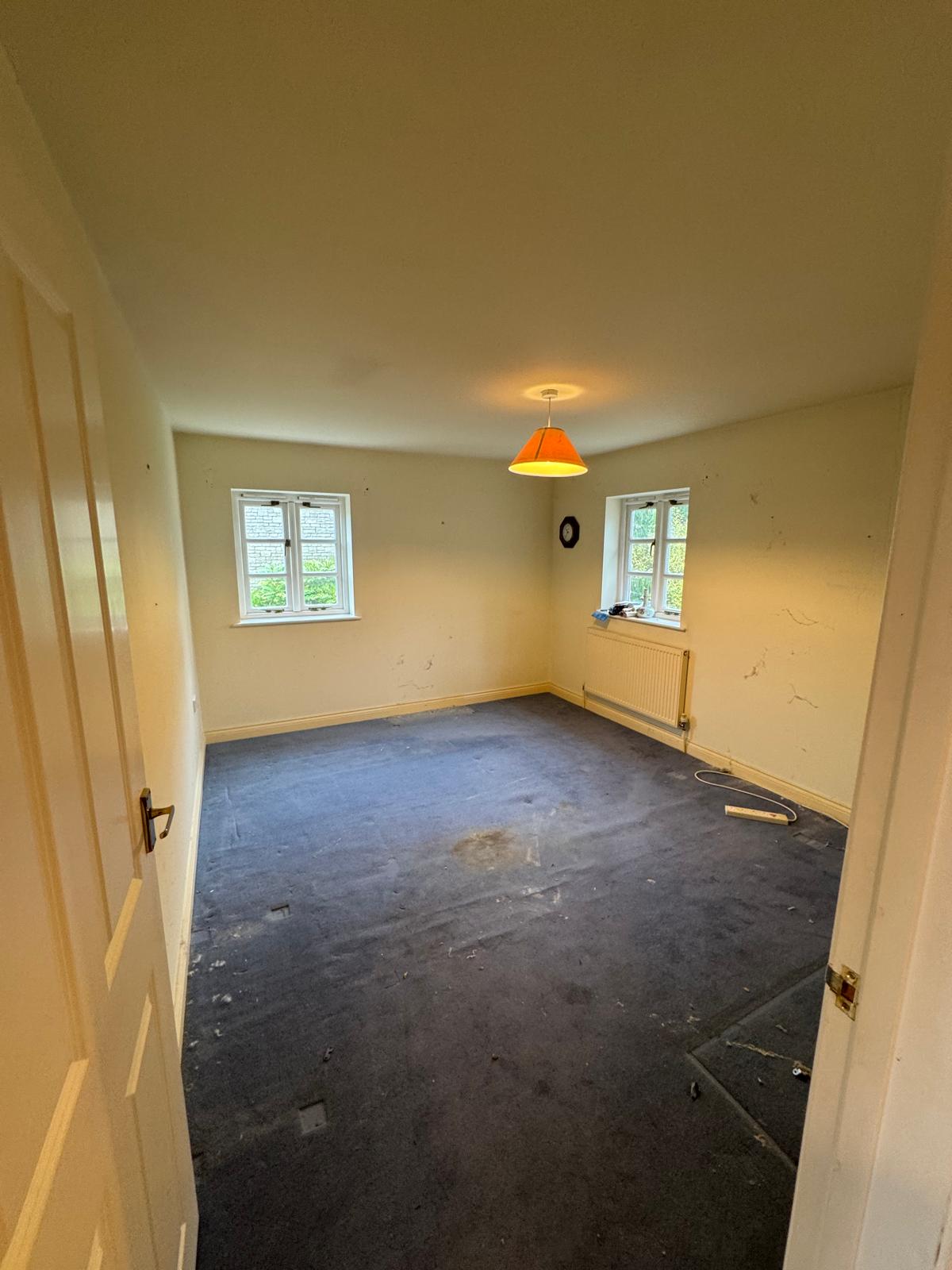 cluttered room before house clearance