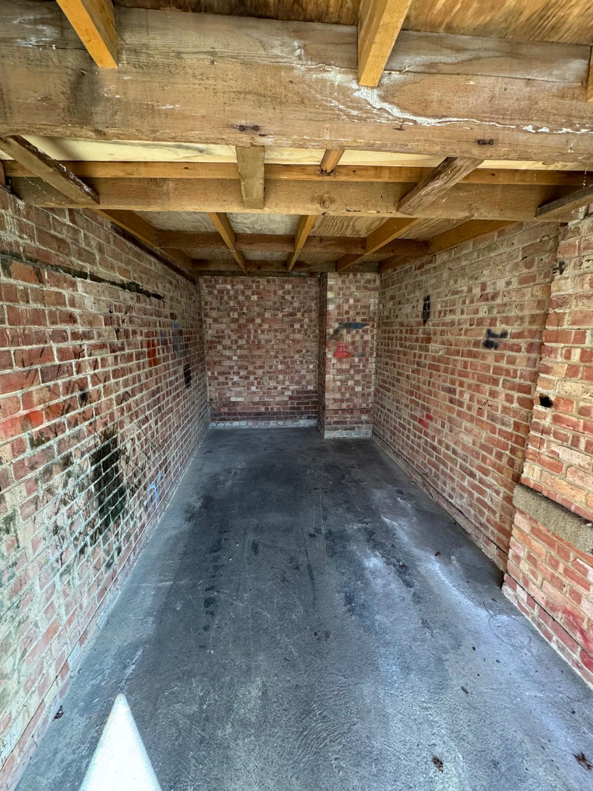 empty brick storage space after clearance