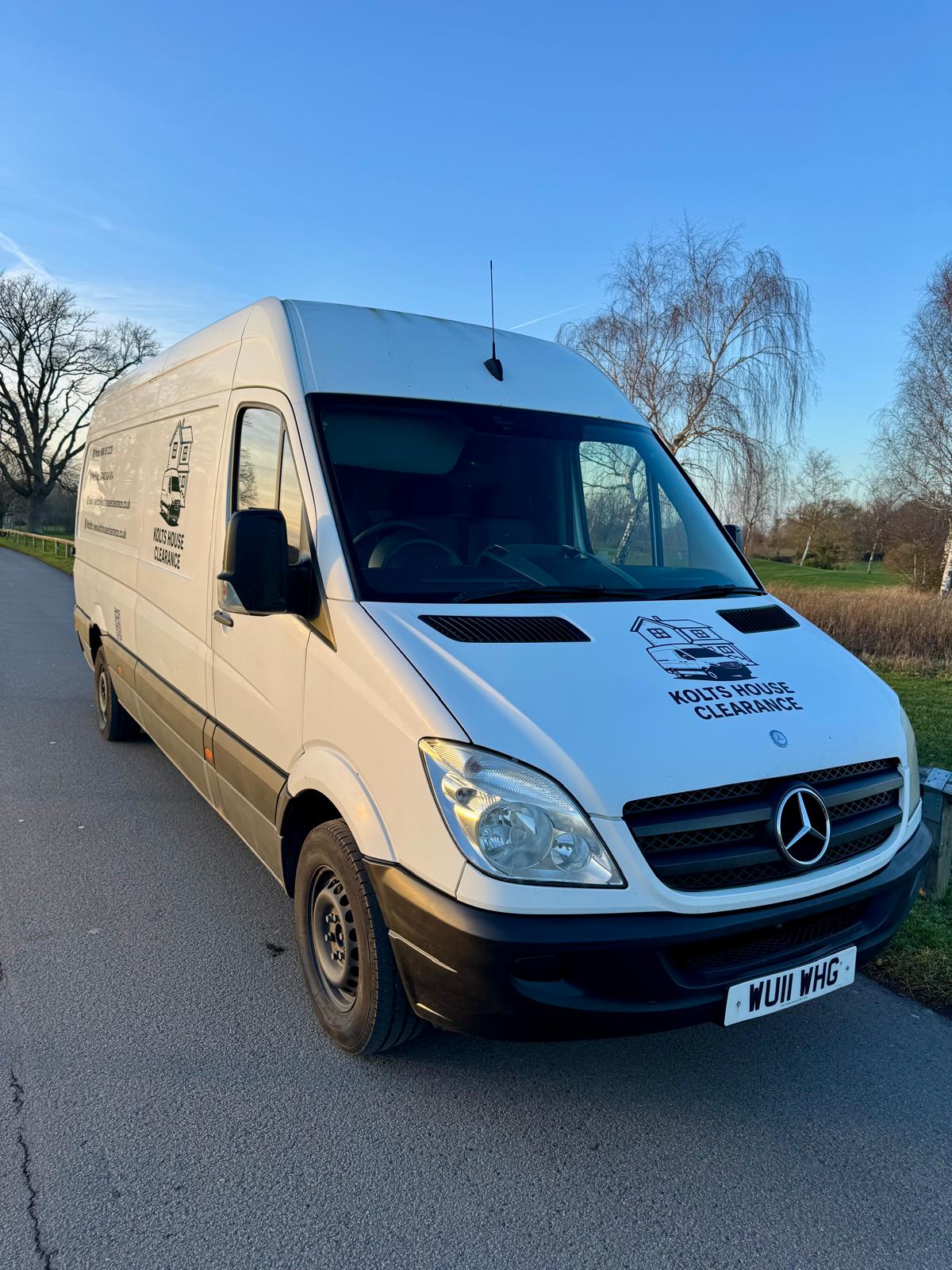 house clearance van on sunny day