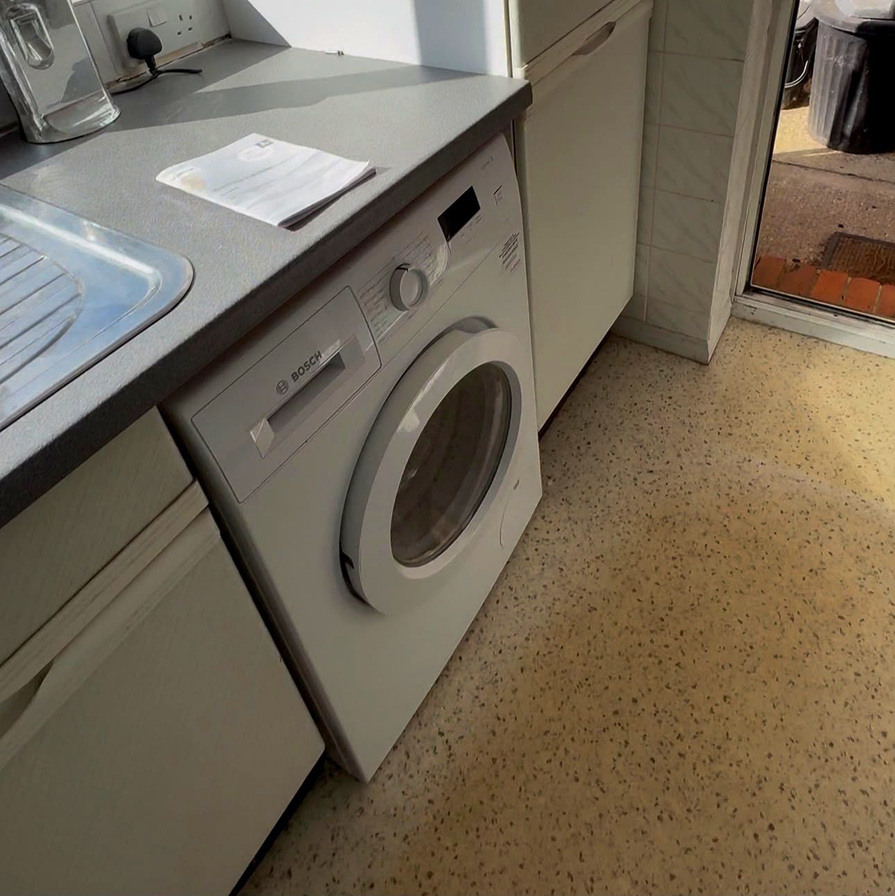Washing machine in kitchen