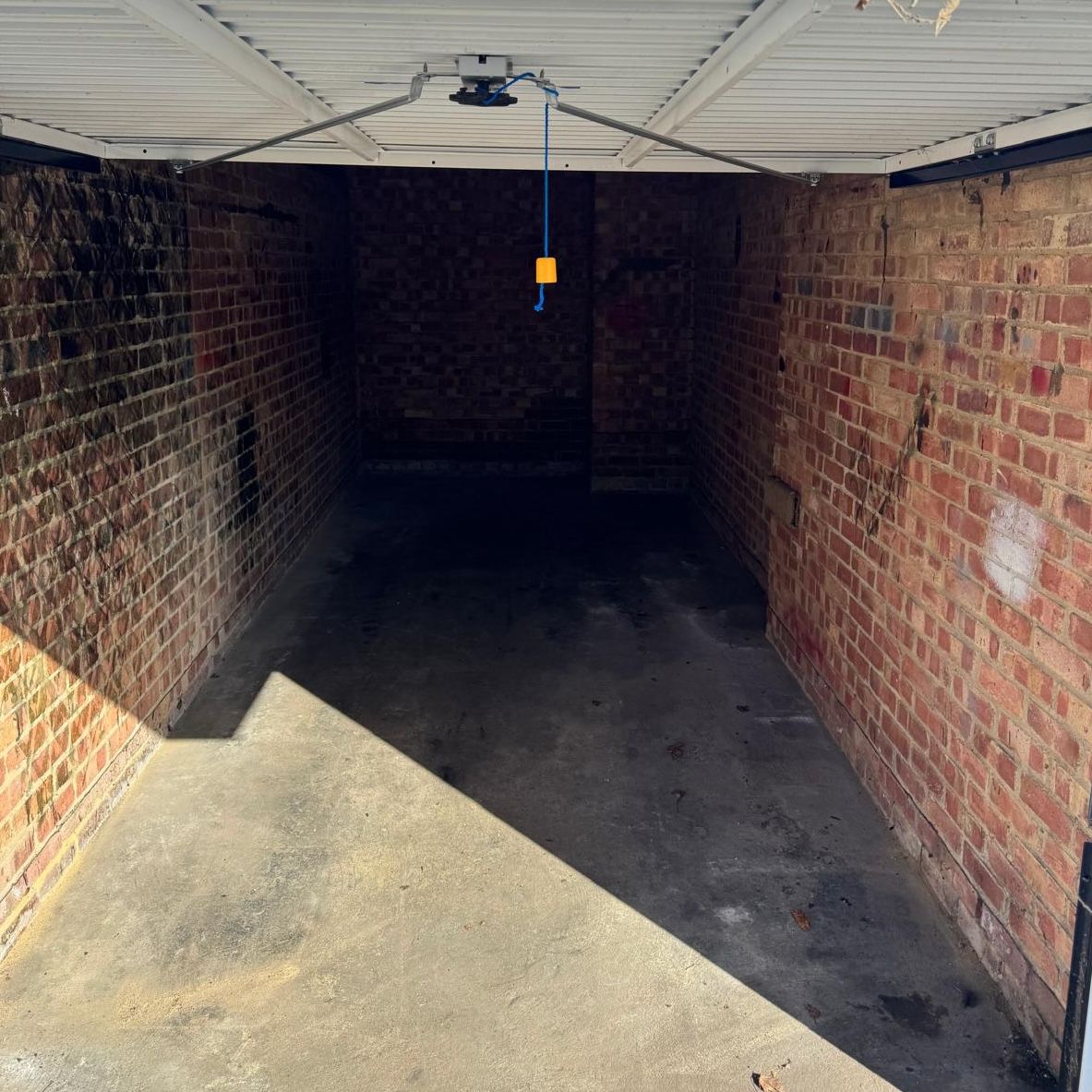 Clean and swept garage floor after clearance