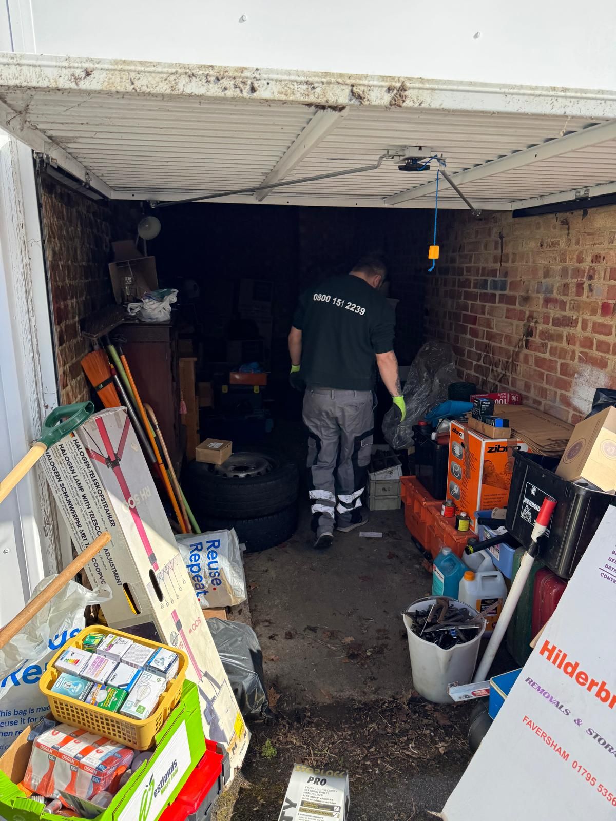 Garage filled with boxes and household junk