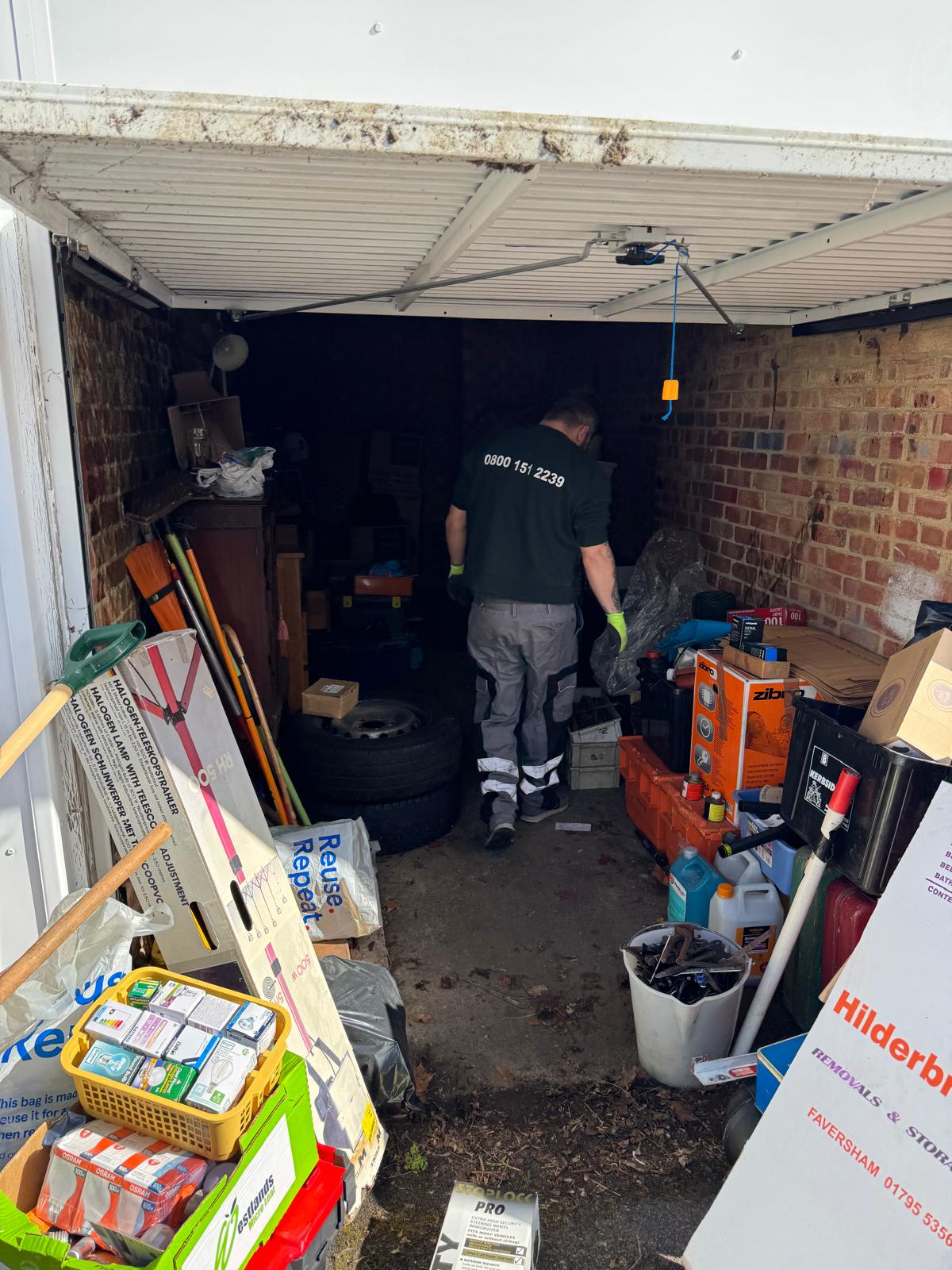 Garage filled with boxes and household junk