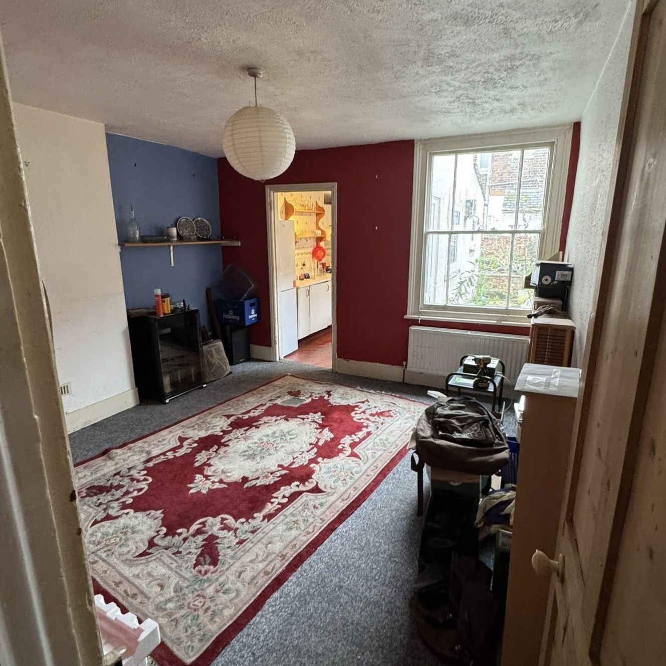 A messy livingroom in RG1 before we cleared it out.